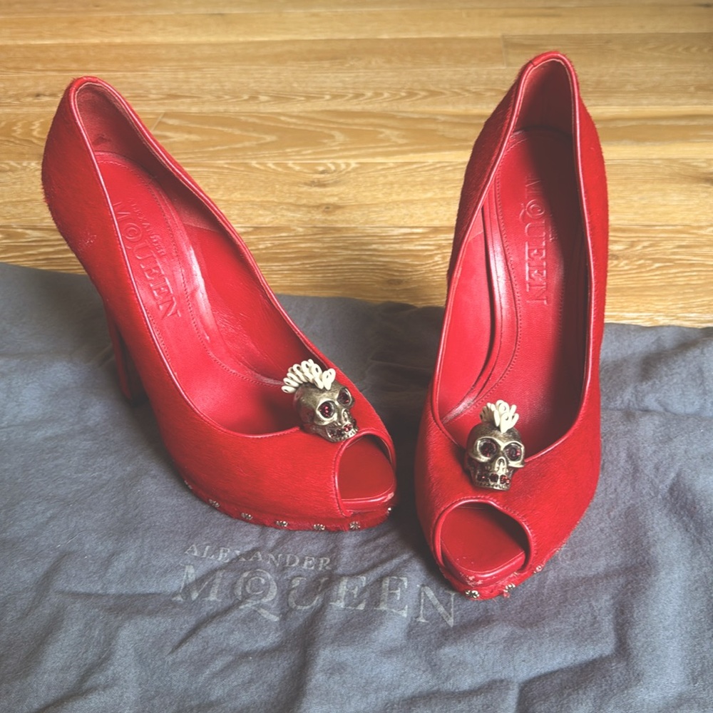Beautiful red cowhide  Alexander McQueen platform heels. Heel is 5.25 inches.